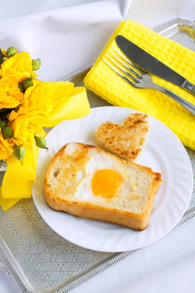 Morning breakfast, omelette, bread, heart shape. — Stock Photo, Image
