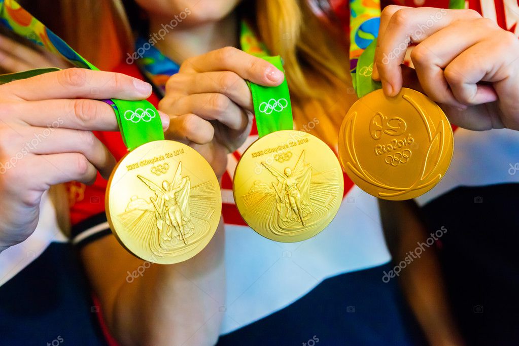 MOSCOW, RUSSIA - AUGUST 24, 2016: Meeting with the russian women handball team.Gold medals of Olympic Games in Rio demonstration