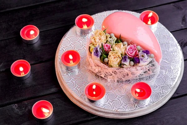 Mirror glaze heart cake dessert on Valentines Day.