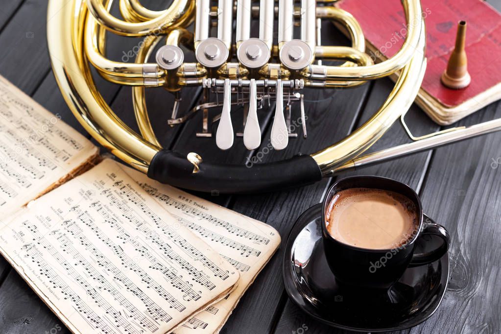  French horn, coffee, notes.