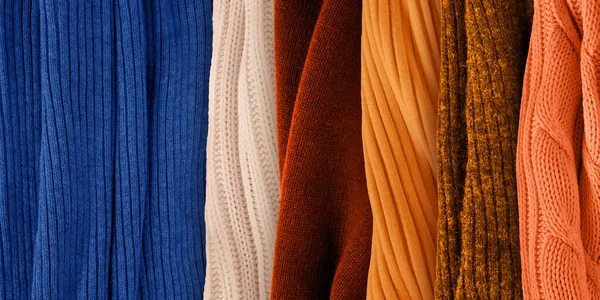 Best orange colors matching for classic blue. Fashion color trends for year 2020. Knitted clothes fabric samples.