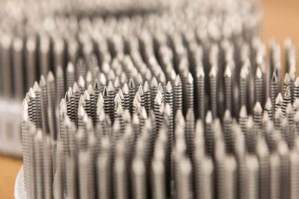 Egy műanyag tekercs pneumatikus Sgek Gun Metal nails — Stock Fotó