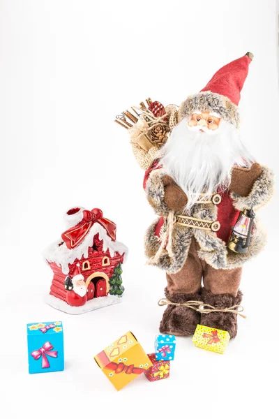 Muñeca de Santa Claus vintage, decoración pequeña casa y cajas de regalo — Foto de Stock