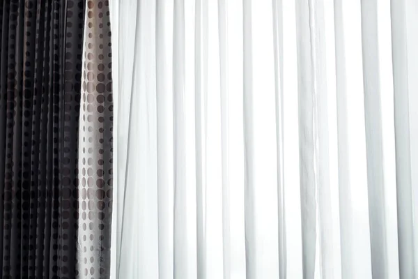 white soft curtain in hotel room