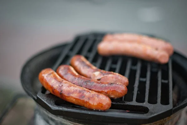 Sausages are grilled. Hot Dog. Street food — Stock Photo, Image