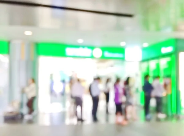 Rozmycie obrazu osób kolejki w bankomat (Atm) — Zdjęcie stockowe