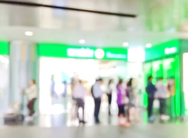 Otomatik vezne makinesi (Atm insanlar sıraya görüntü bulanıklığı)