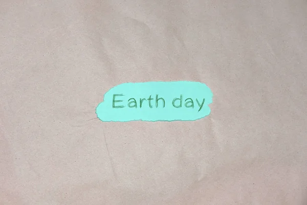 Hand Drawn Writing Earth Day Blue Craft Paper Background — Stock Photo, Image