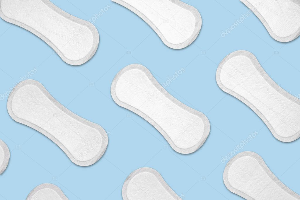 Female menstrual pads in blue background.