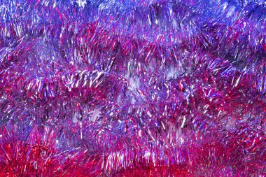 Neon ışığı altında Tinsel arkaplan. 