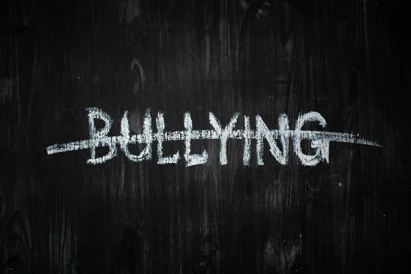 Bullying Word Crossed Out Black Wood Background Sign Concept Dealing — Stock Photo, Image