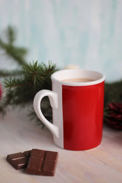 Mug filled with hot chocolate and christmas tree — Stock Photo, Image