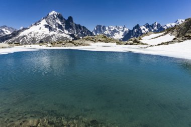 Lake Lac Blanc on the background of Mont Blanc massif. Alps. clipart