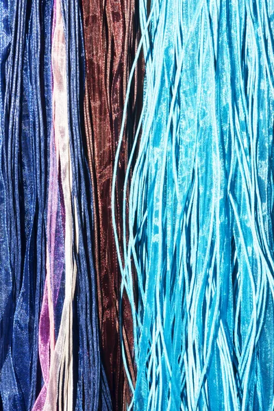 Many strands of colored cloth