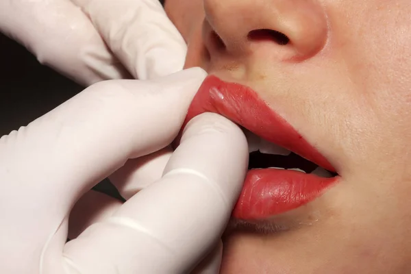 Contour plastic:  Lips massage after the contour plastic