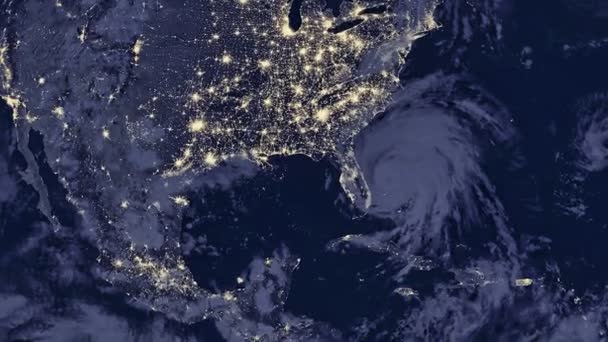 Uzaydan zoom ile görülen ve Amerikan kıtalarına yakın dönen Dünya gezegeni geceleri ışık saçıyor. - NASA tarafından desteklenen bu animasyonun elementleri.