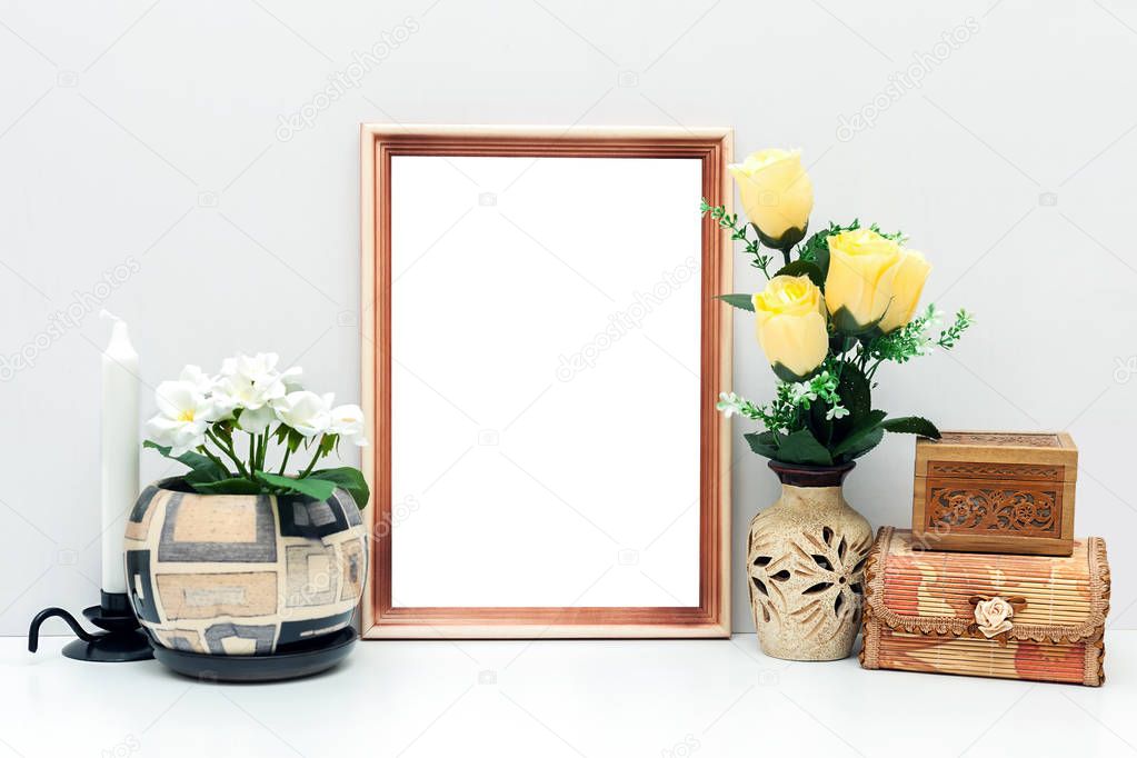 Download A4 wooden frame mockup with flowers and boxes — Stock ...