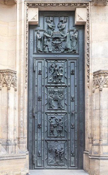 Old iron door - entrance to the medieval Gothic cathedral, heavy wrought iron door to the castle