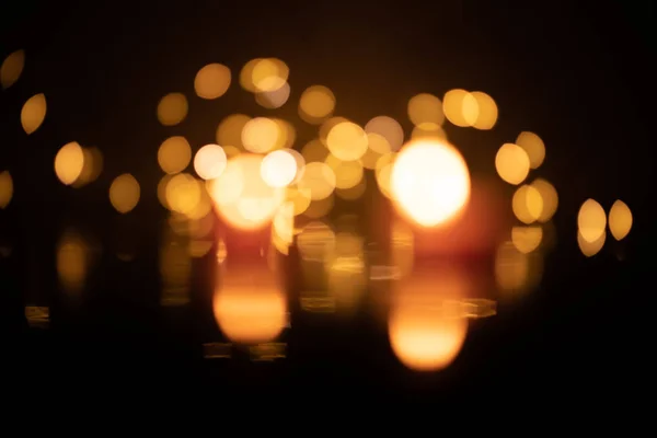 Bokeh Two Candles Background Yellow Led Lights — Stock Photo, Image