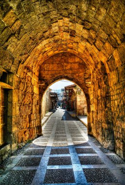 Arch view to Jbail market and street, Lebanon clipart