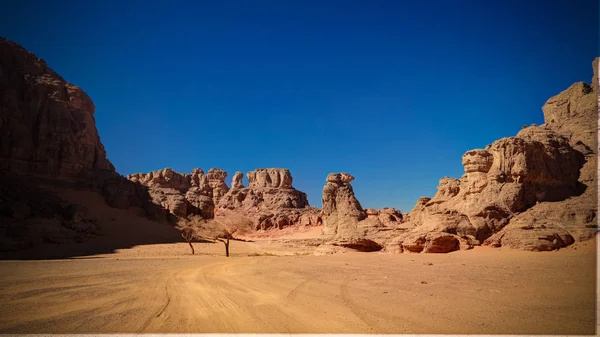 Landscape of sand dune and sandstone nature sculpture at Tamezguida in Tassili nAjjer national park, Algeria — Stock Photo, Image