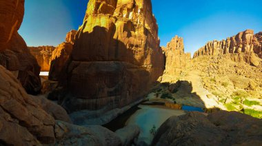Panorama inside canyon aka Guelta d'Archei in East Ennedi, Chad clipart