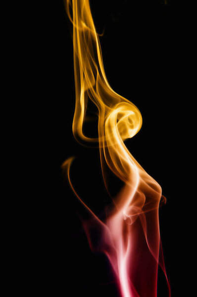 Abstract red and orange smoke on black background
