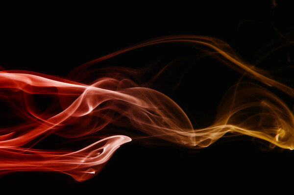 Abstract red and orange smoke on black background