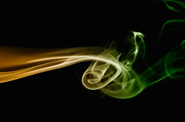 Fumo amarelo e verde — Fotografia de Stock