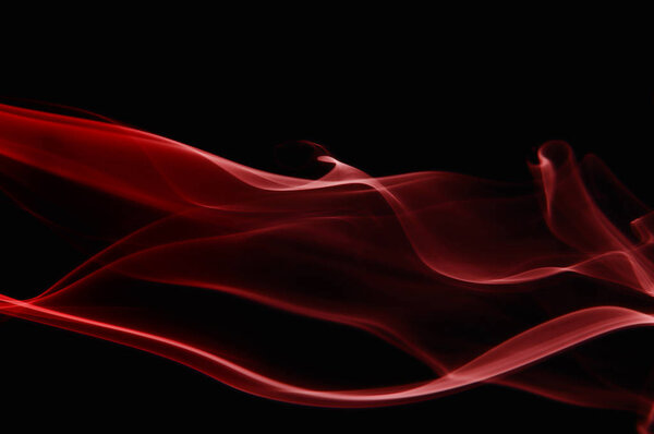 Abstract beautiful red smoke on black background