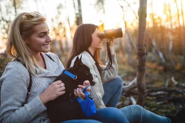 Women with French bulldog puppy — Stock Photo, Image