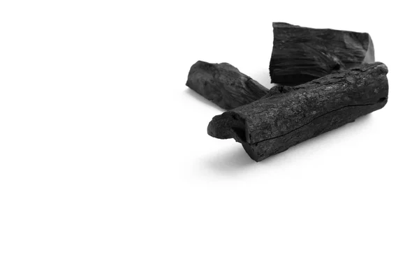 Carbone nero su sfondo bianco — Foto Stock