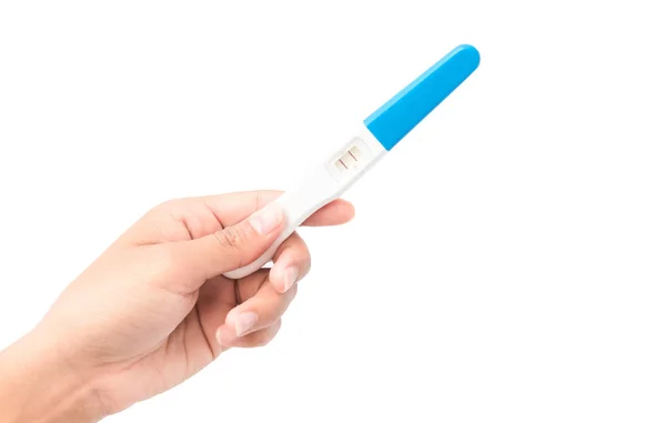 Mulher mão segurando teste de gravidez com fundo branco — Fotografia de Stock