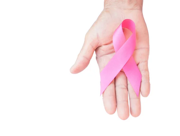 Nahaufnahme alte Frau Hand hält rosa Schleife auf weißem Hintergrund, Bewusstsein Brustkrebs-Konzept — Stockfoto