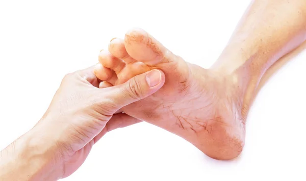 Hand holding feet old women, take care feeling with white background Stock Photo