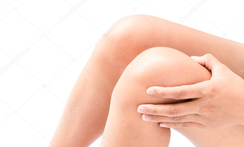 Closeup woman hand hold knee with pain symptom, health care and medicine concept