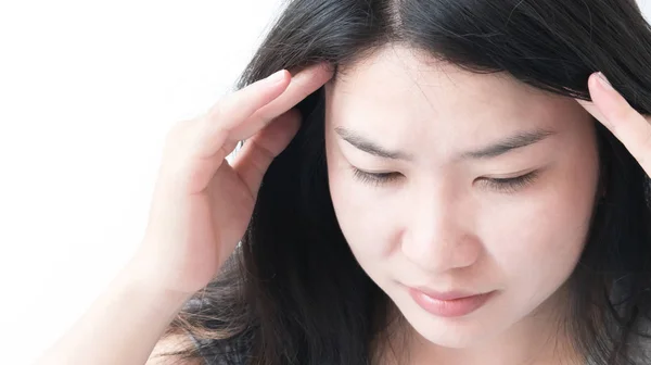 Closeup asian woman having headache with whitebackground — Stock Photo, Image