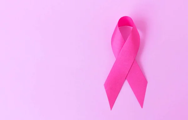 Pink ribbon on pink background, Awareness breast cancer concept — Stock Photo, Image