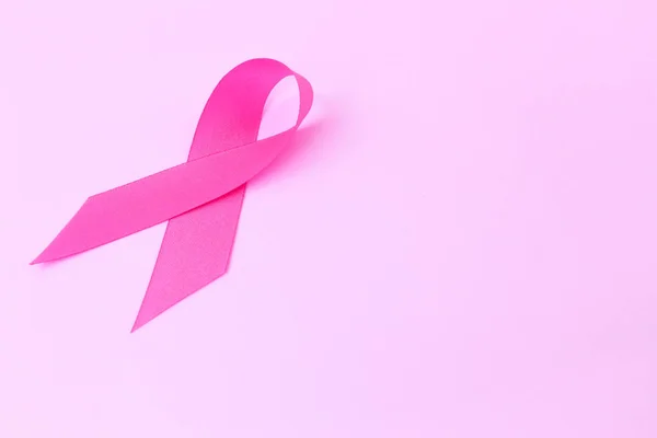 Pink ribbon on pink background, Awareness breast cancer concept — Stock Photo, Image