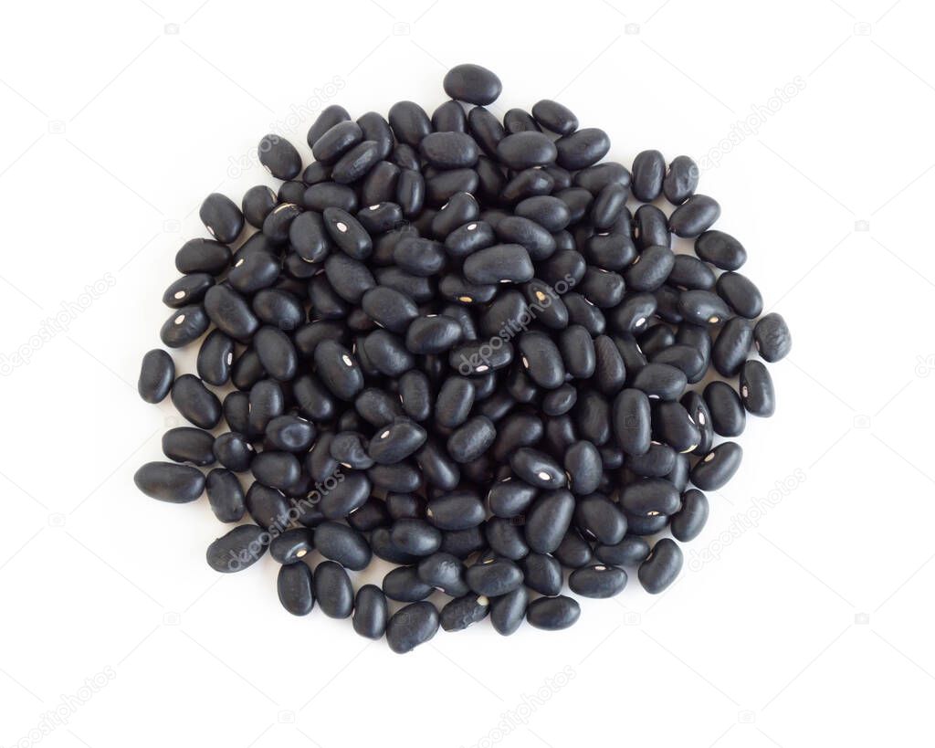 Closeup black beans seeds isolated on white background, healthy food concept
