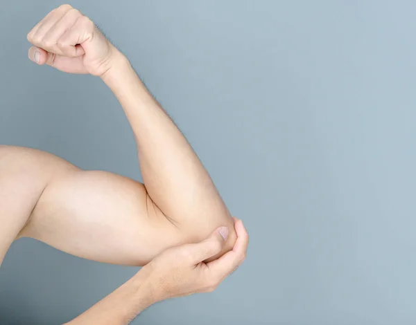 Closeup Man Hand Holding Elbow Pain Grey Background Health Care Stock Image