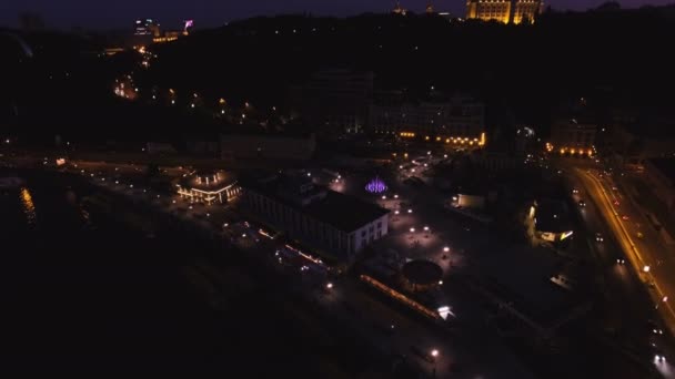 Aerial View of European City at Night with Illuminated Light from Cars, Seafront. Shot in 4K UHD — Stock Video