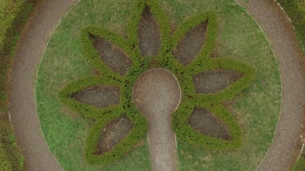 Above top view beautiful garden labyrinth 4K UHD aerial footage — Stock Video