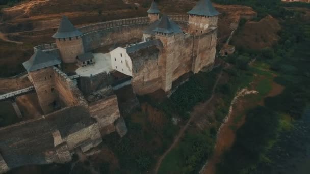 Old castle on the river bank aerial drone footage — Stock Video