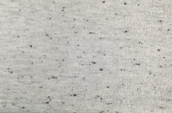 Textura de tecido cinza com manchas pretas — Fotografia de Stock