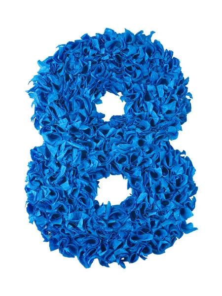 Nyolc. Kézzel készített száma 8 kék darabka papír — Stock Fotó