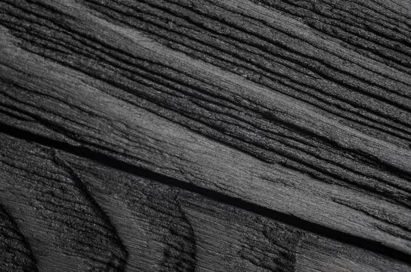 Macro Snapshot of Black Wood Surface