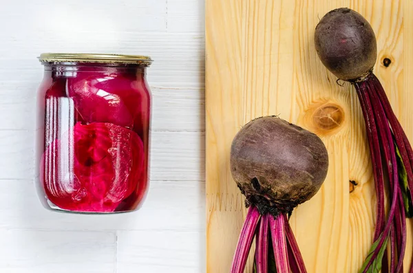 Glass jar with canned beets — Stock Photo, Image