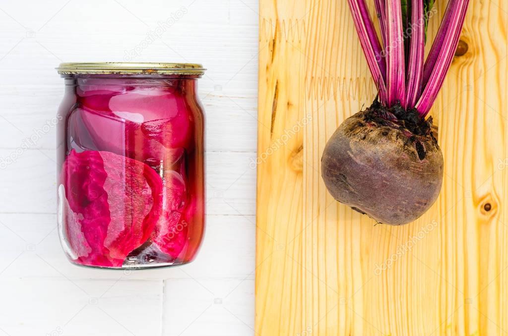 Glass jar with canned beets