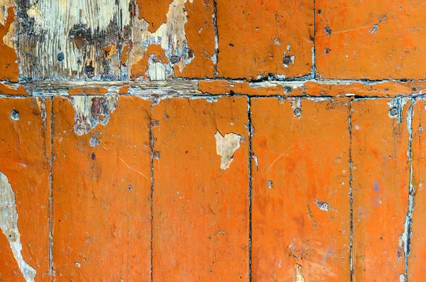 Pintura esfoliada em um piso de madeira velha — Fotografia de Stock